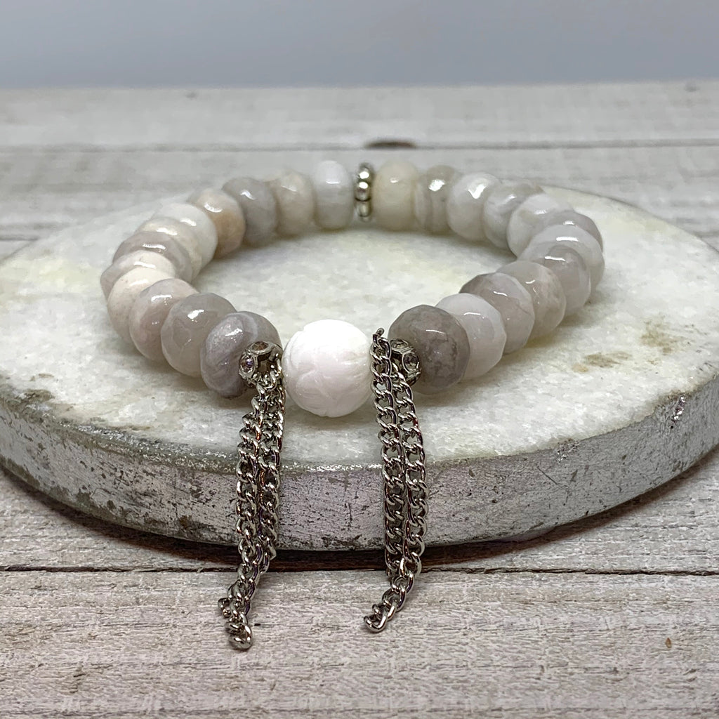 The Alissa Bracelet- Cunky Rondelle Agate Beads with a carved Lotus Tridacna Bead.