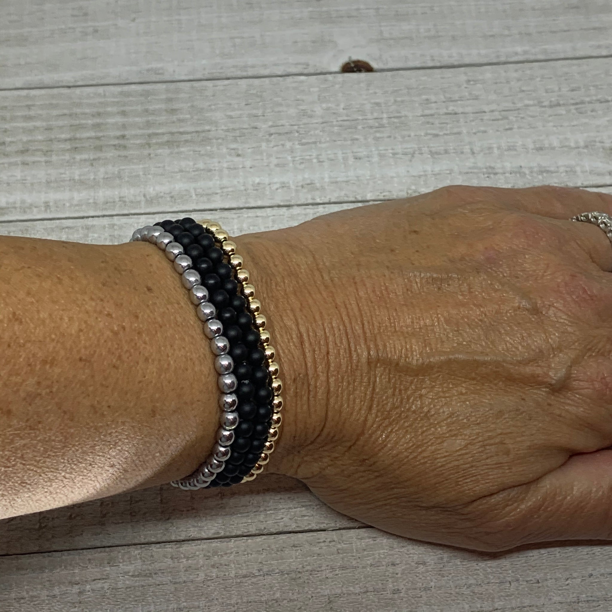 Gold, Silver & Black Stack Bracelets