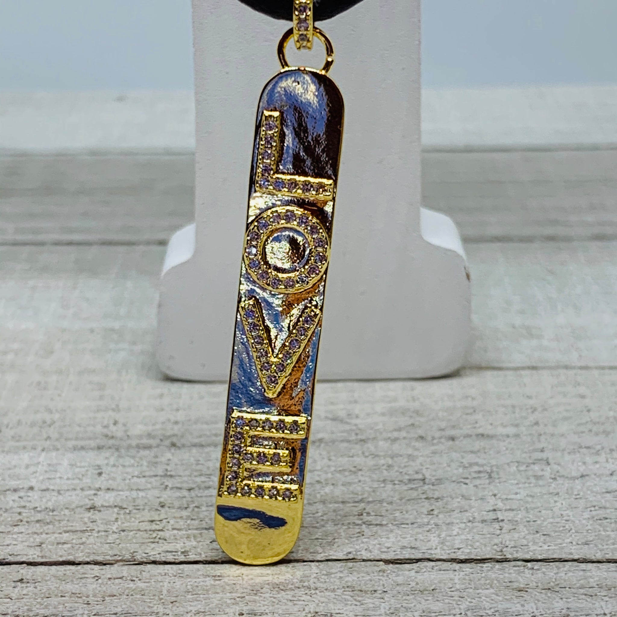 Love Pendant on a Leather Cord Necklace