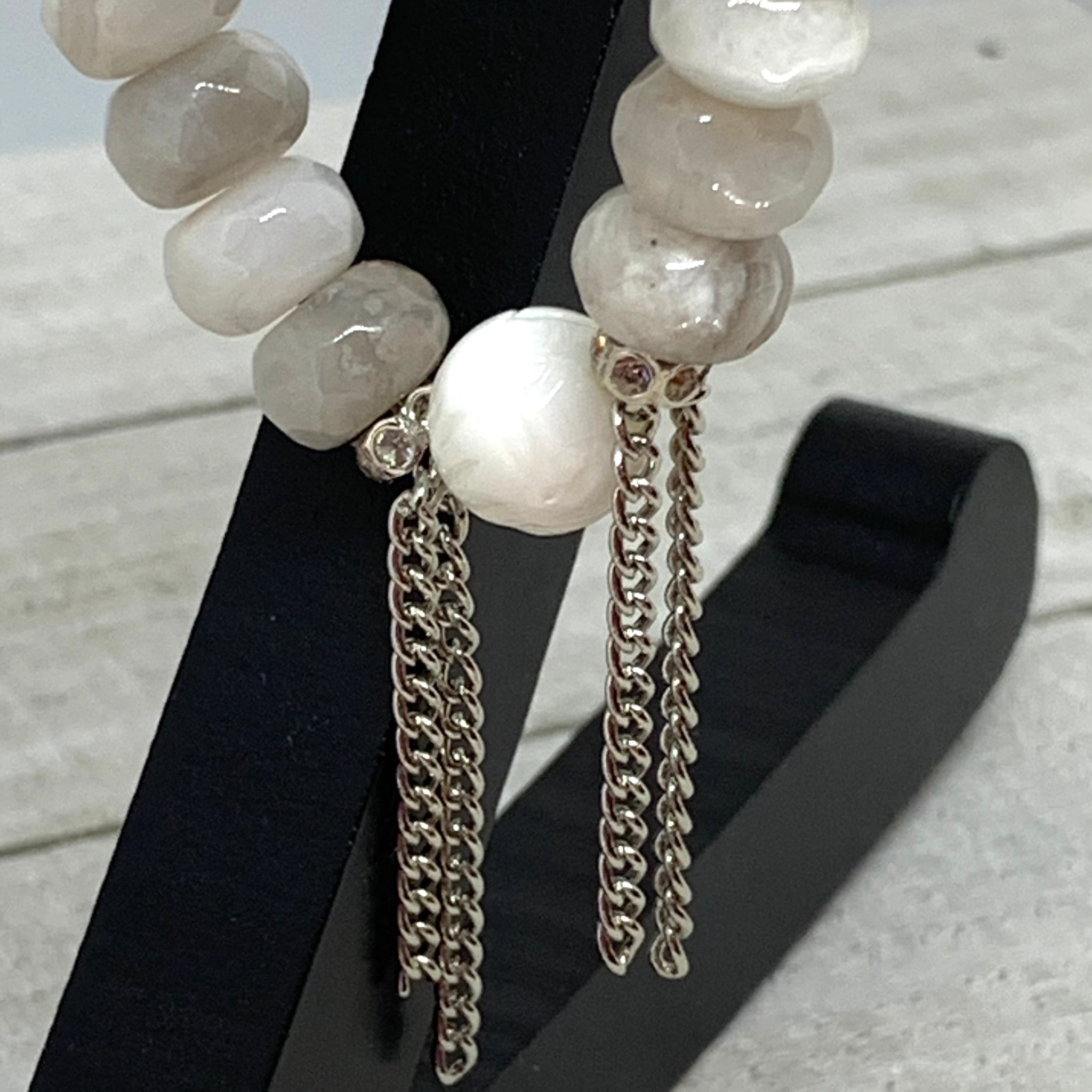 The Alissa Bracelet- Cunky Rondelle Agate Beads with a carved Lotus Tridacna Bead.