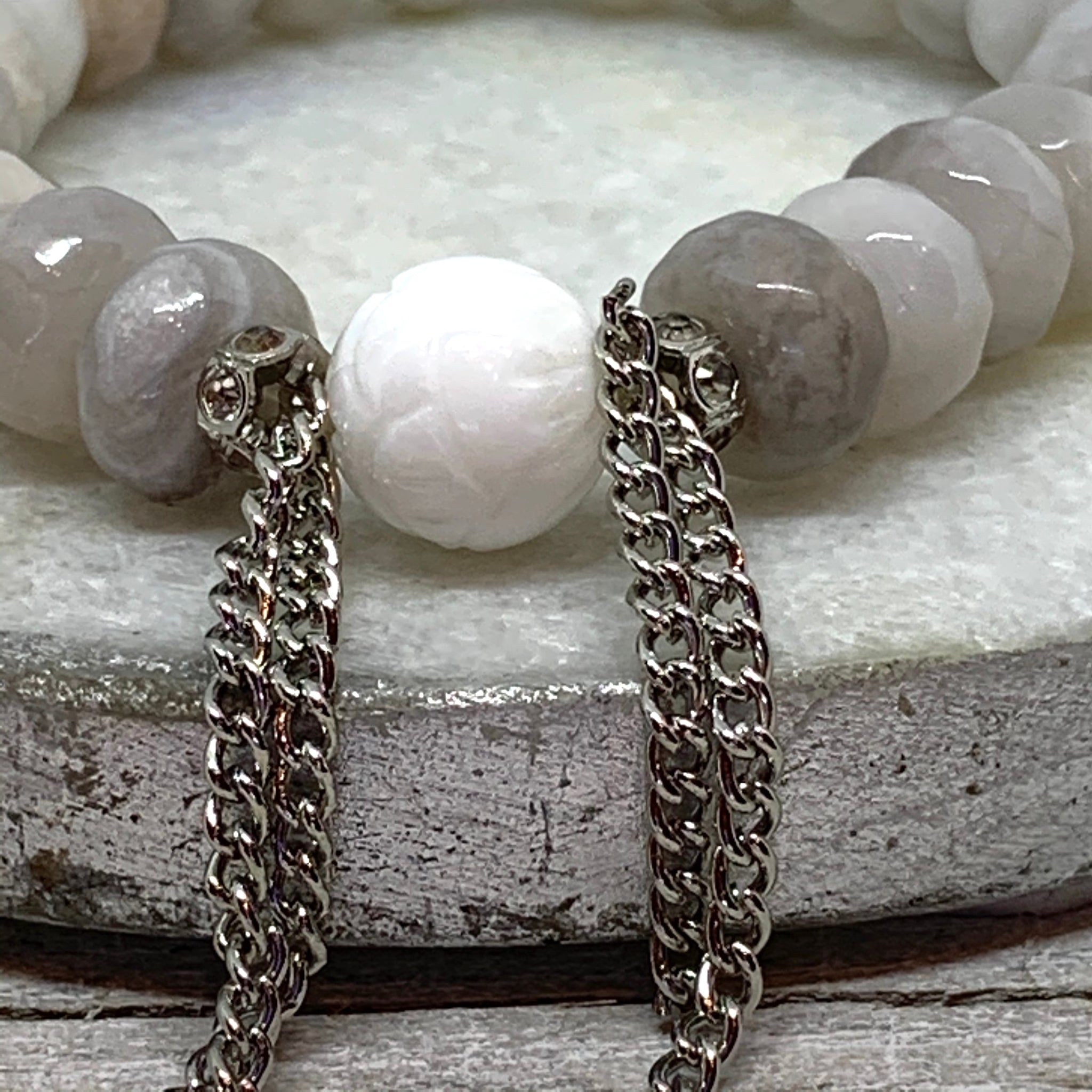 The Alissa Bracelet- Cunky Rondelle Agate Beads with a carved Lotus Tridacna Bead.