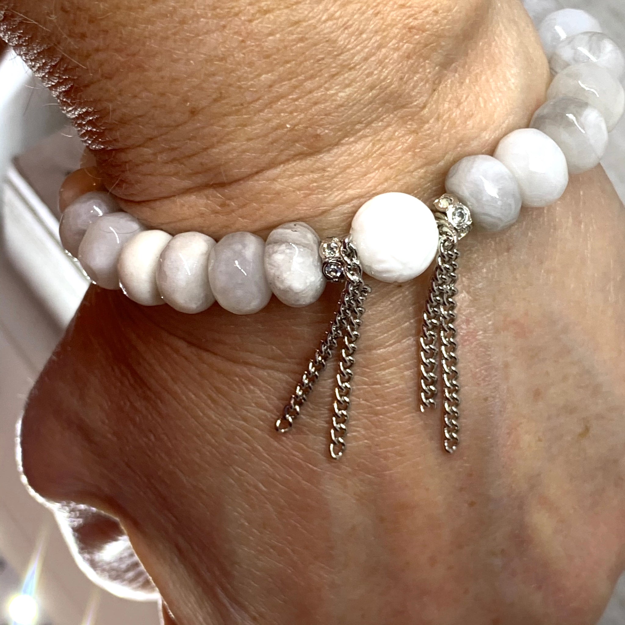 The Alissa Bracelet- Cunky Rondelle Agate Beads with a carved Lotus Tridacna Bead.