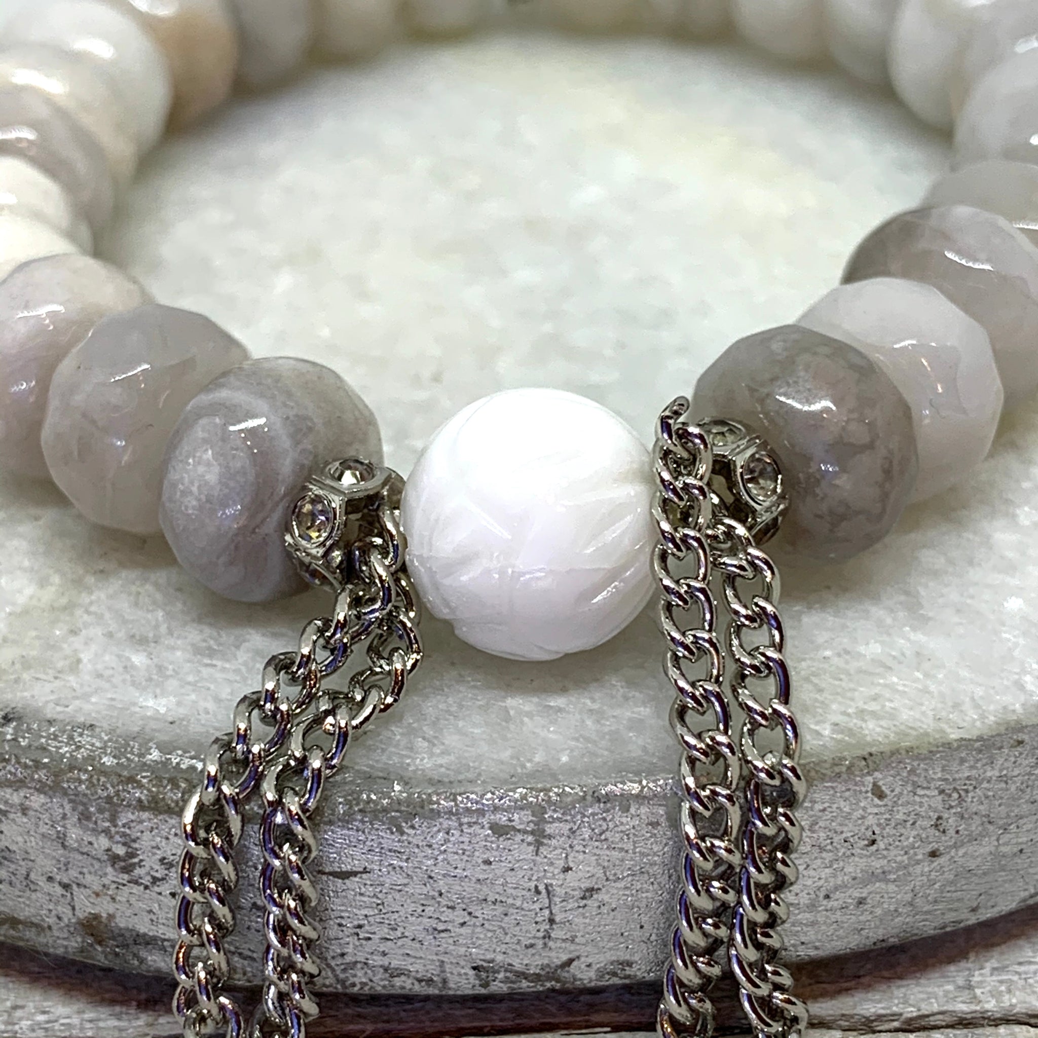 The Alissa Bracelet- Cunky Rondelle Agate Beads with a carved Lotus Tridacna Bead.
