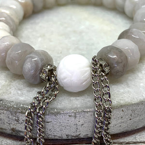 The Alissa Bracelet- Cunky Rondelle Agate Beads with a carved Lotus Tridacna Bead.