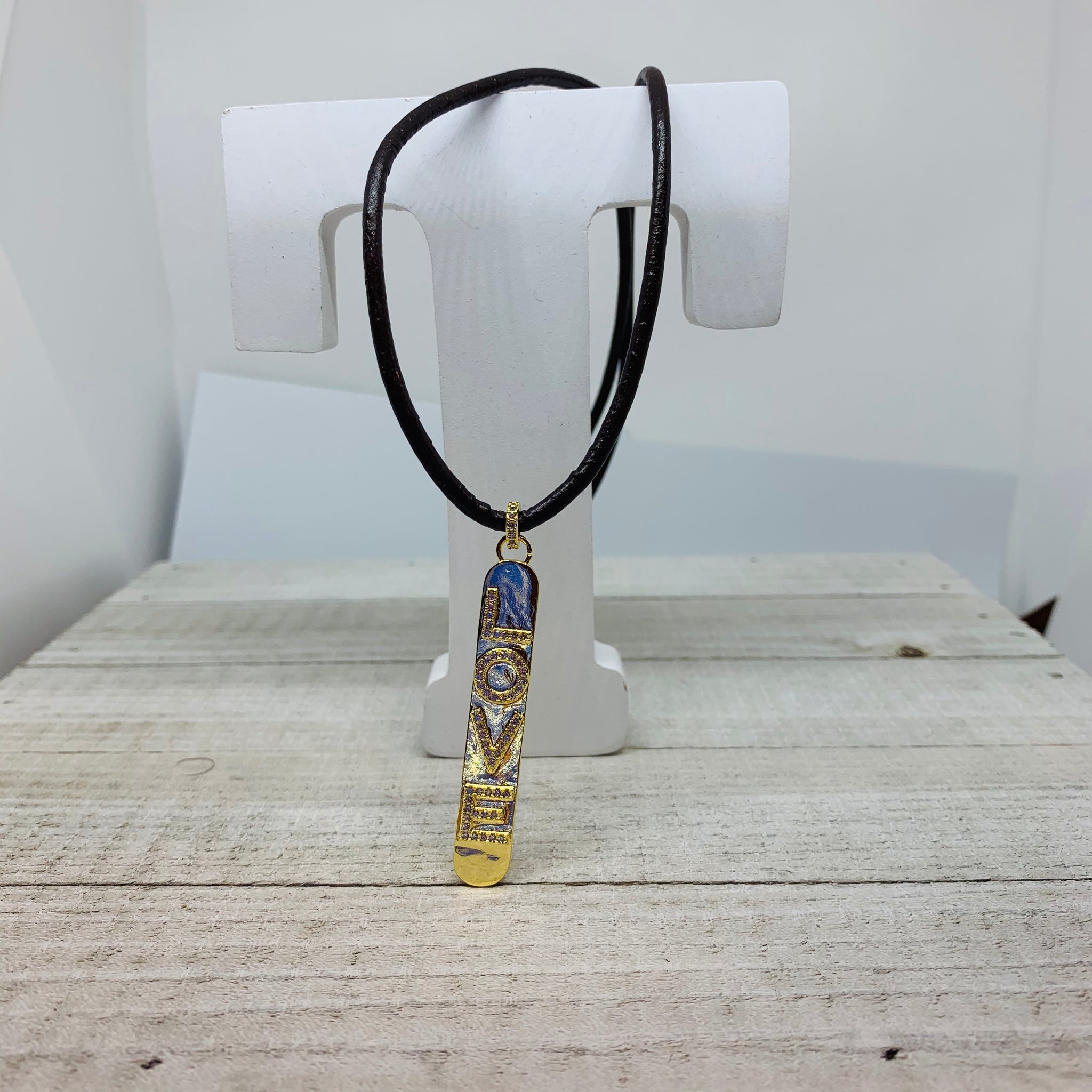 Love Pendant on a Leather Cord Necklace