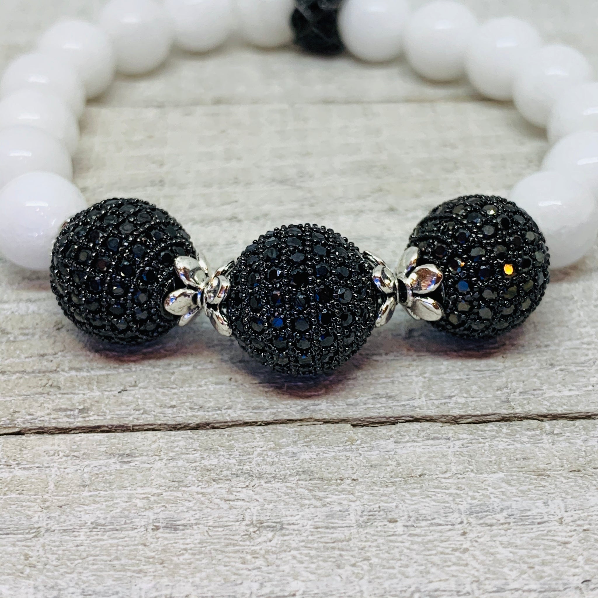 White Mountain Jade with (3) 12 mm Black Micro Mini Pave Black Bead Balls.