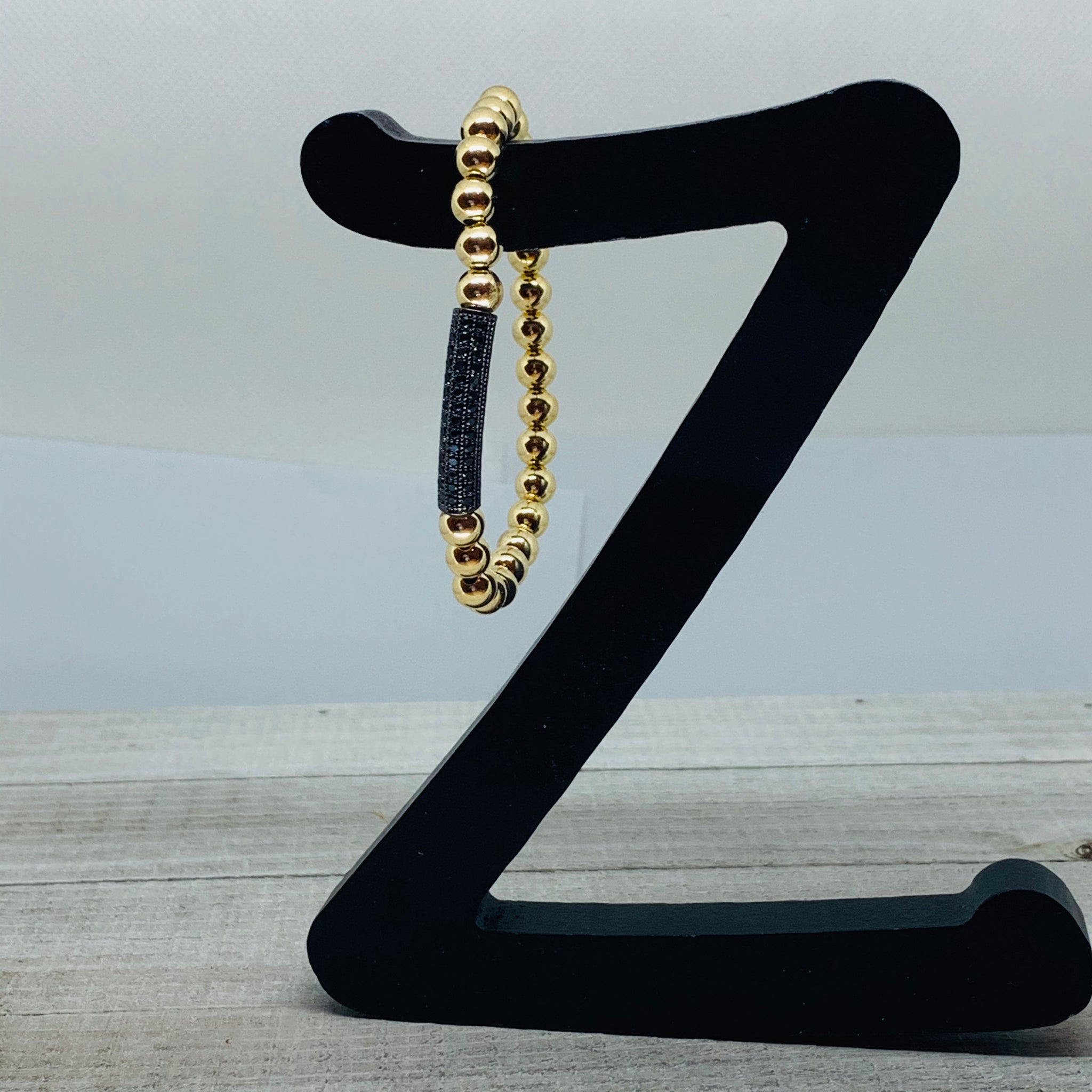 Gold and Black Tube Bead Bracelet