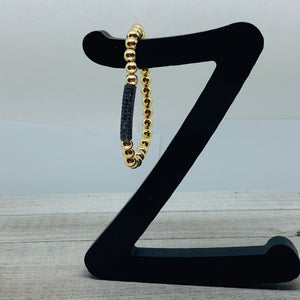 Gold and Black Tube Bead Bracelet