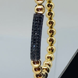 Gold and Black Tube Bead Bracelet