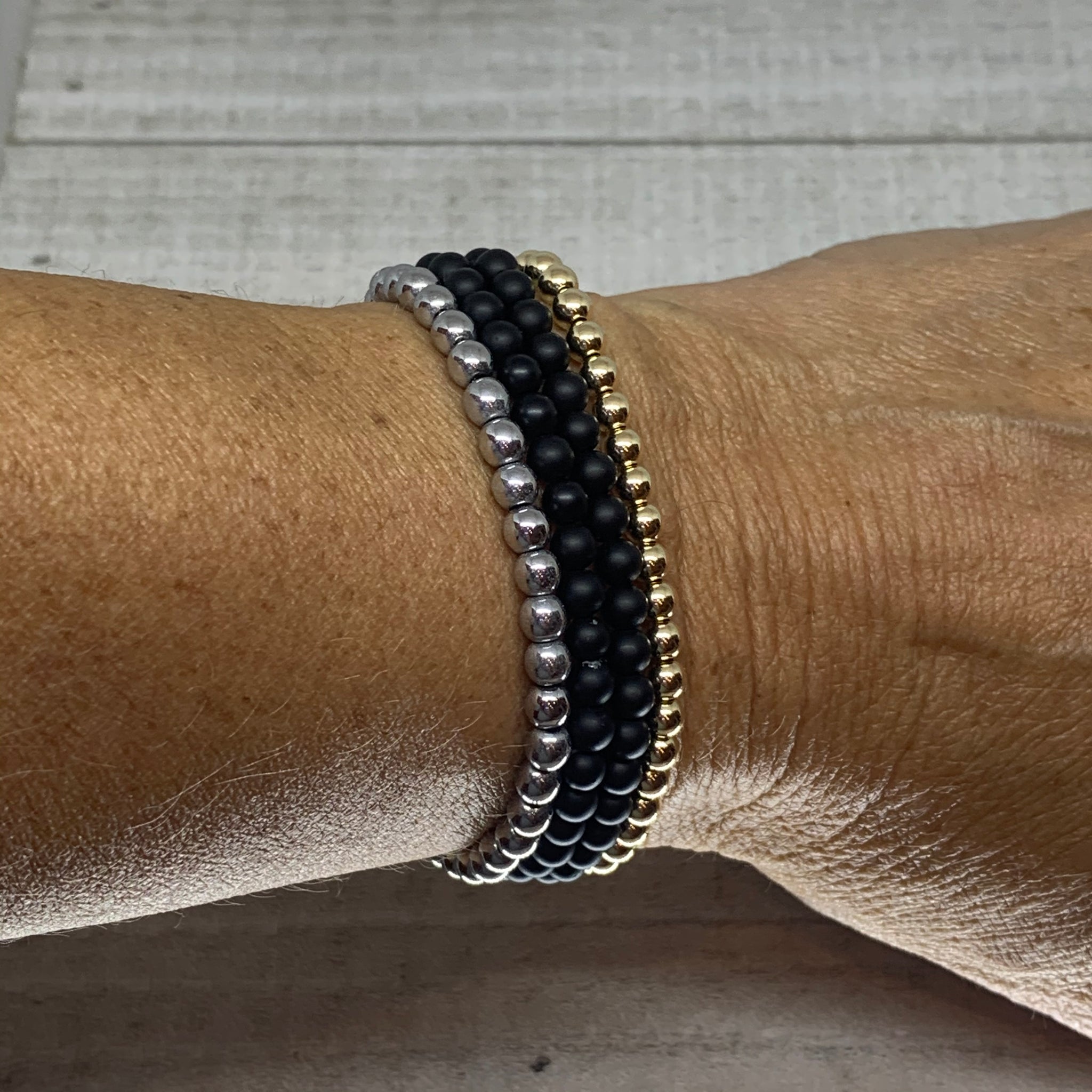 Gold, Silver & Black Stack Bracelets